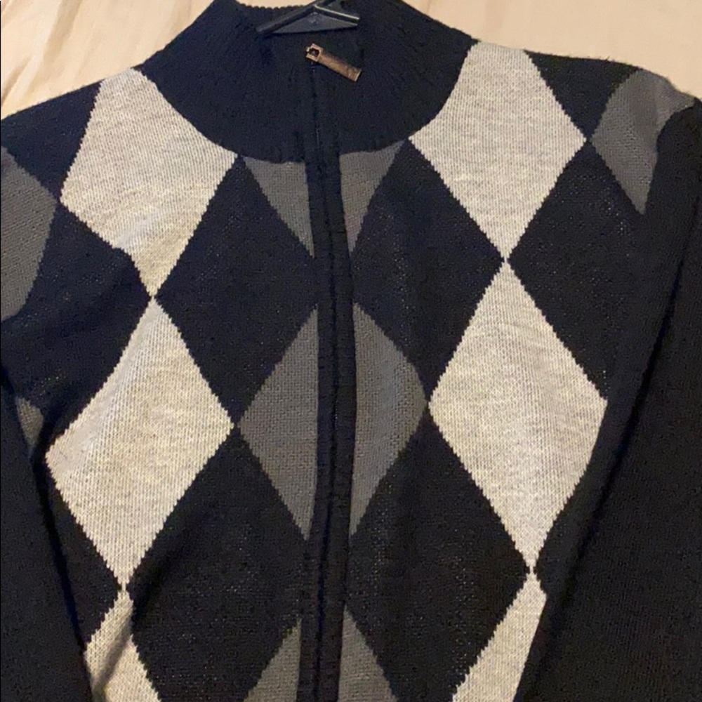 Grey, white and black sweater